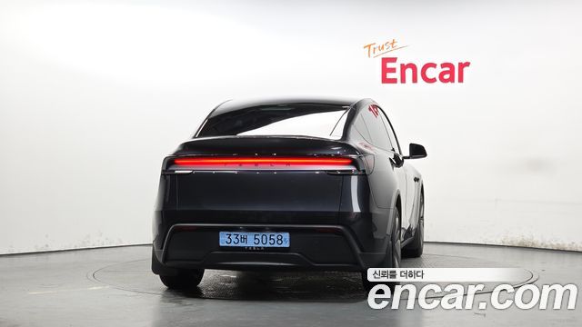 Tesla Model Y 2025 — photo 4