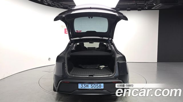 Tesla Model Y 2025 — photo 26