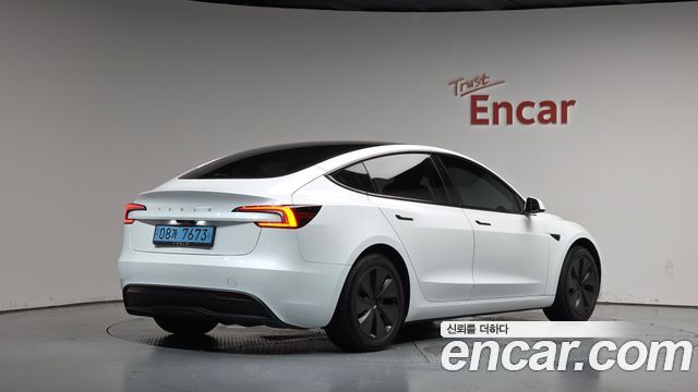 Tesla Model 3 2024 — photo 2