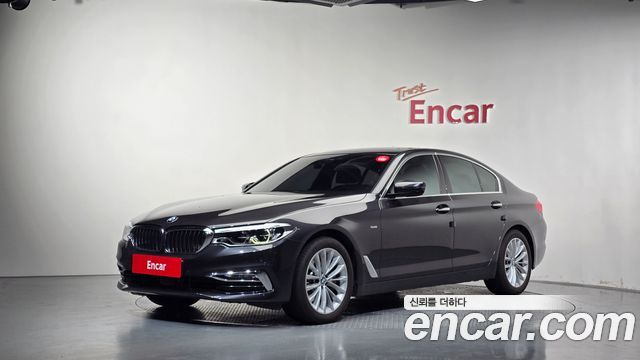 BMW 5-Series 2018 — photo 1