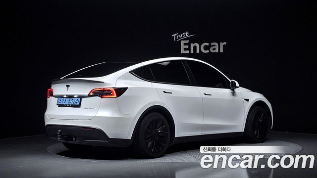 Tesla Model Y 2021 — photo 2