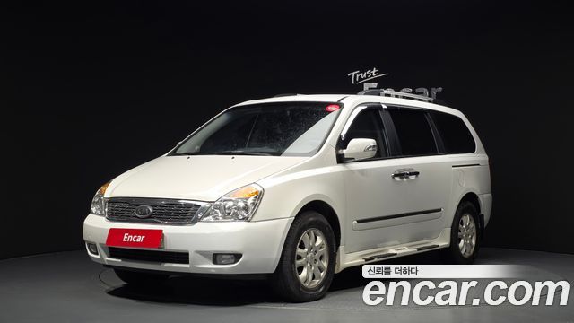 Kia Canival 2010 — photo 1
