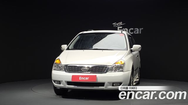 Kia Canival 2010 — photo 3