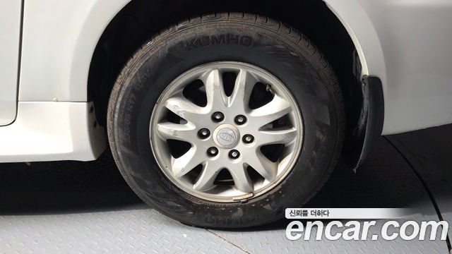 Kia Canival 2010 — photo 5