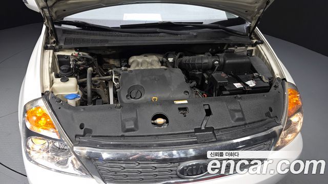 Kia Canival 2010 — photo 6