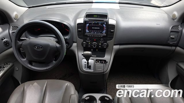 Kia Canival 2010 — photo 7