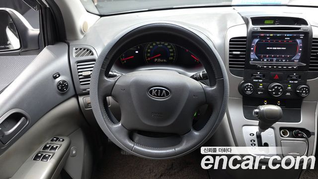 Kia Canival 2010 — photo 13