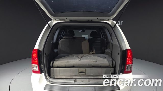 Kia Canival 2010 — photo 20