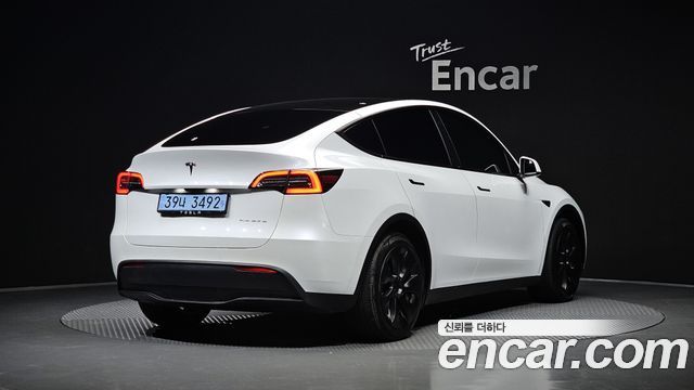 Tesla Model Y 2021 — photo 2