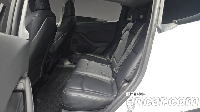 Tesla Model Y 2021 — photo 18