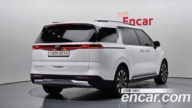 Kia Canival 2021 — photo 2