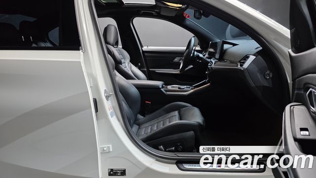 BMW 3-Series 2023 — photo 16