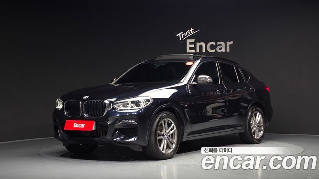 BMW X4 2021 — photo 1