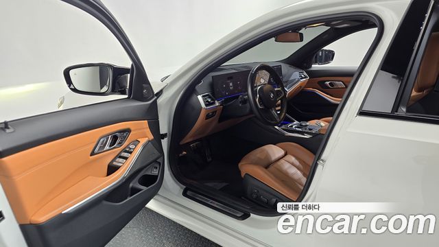 BMW 3-Series 2024 — photo 13