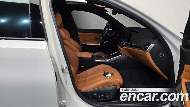 BMW 3-Series 2024 — photo 16
