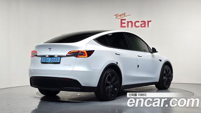 Tesla Model Y 2021 — photo 2