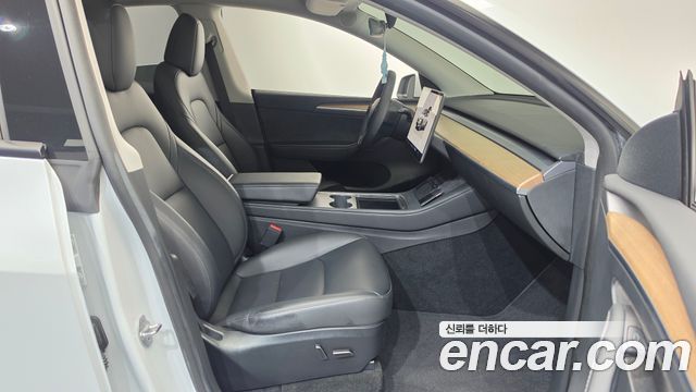 Tesla Model Y 2023 — photo 16