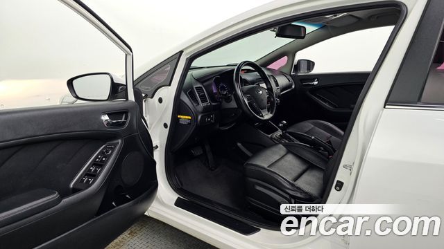 Kia K3 2013 — photo 10