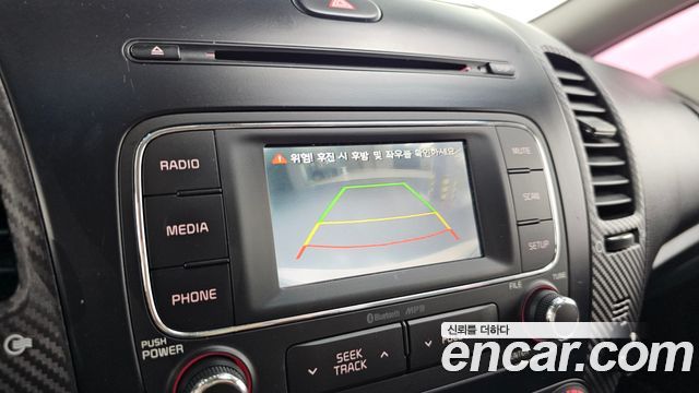 Kia K3 2013 — photo 15