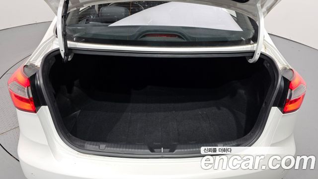 Kia K3 2013 — photo 18