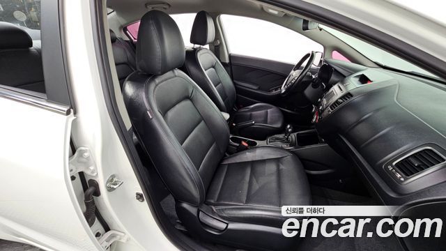 Kia K3 2013 — photo 19