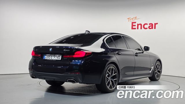 BMW 5-Series 2022 — photo 2