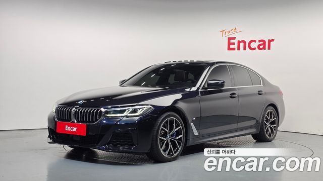 BMW 5-Series 2023 — photo 1