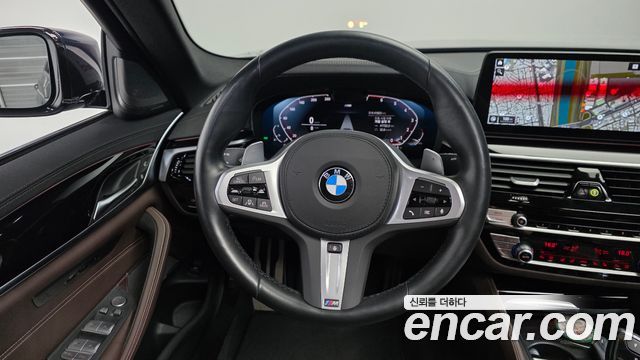 BMW 5-Series 2023 — photo 13