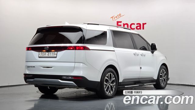 Kia Canival 2021 — photo 2