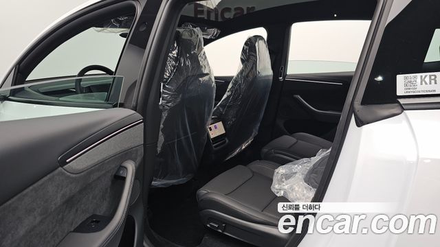 Tesla Model Y 2026 — photo 18