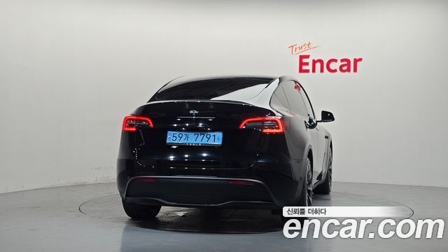 Tesla Model Y 2023 — photo 4