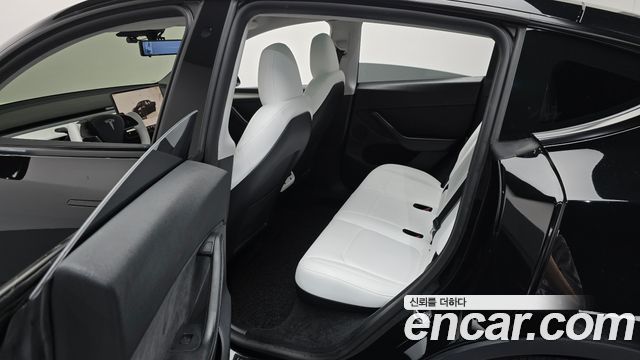 Tesla Model Y 2023 — photo 17