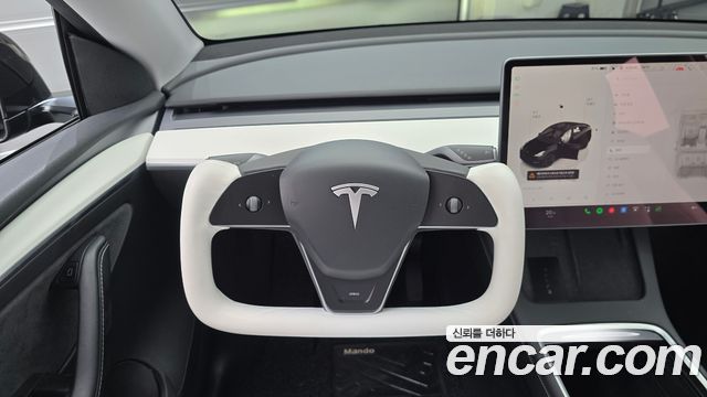 Tesla Model Y 2023 — photo 19