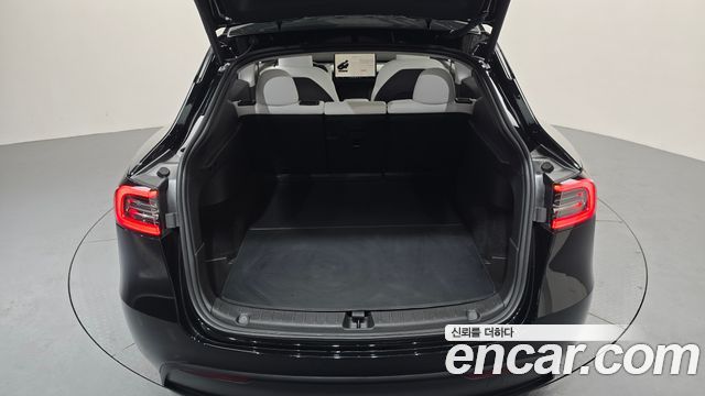 Tesla Model Y 2023 — photo 23