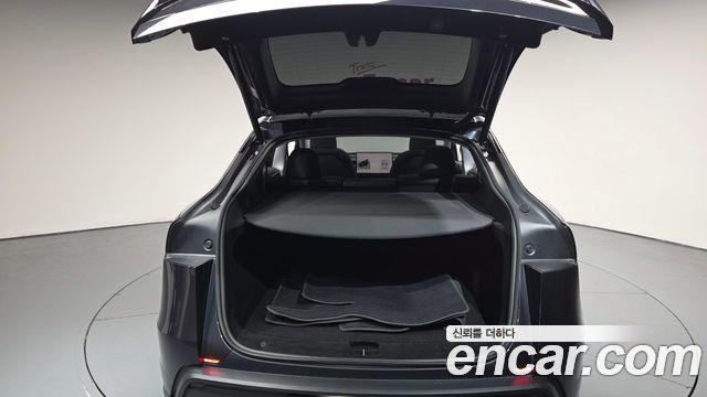 Tesla Model Y 2025 — photo 34