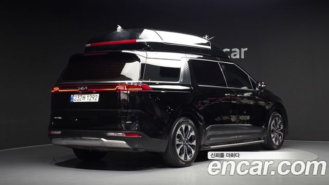 Kia Canival 2023 — photo 2