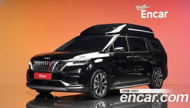 Kia Canival 2023 — photo 1