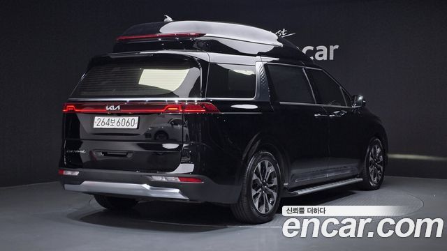 Kia Canival 2021 — photo 2