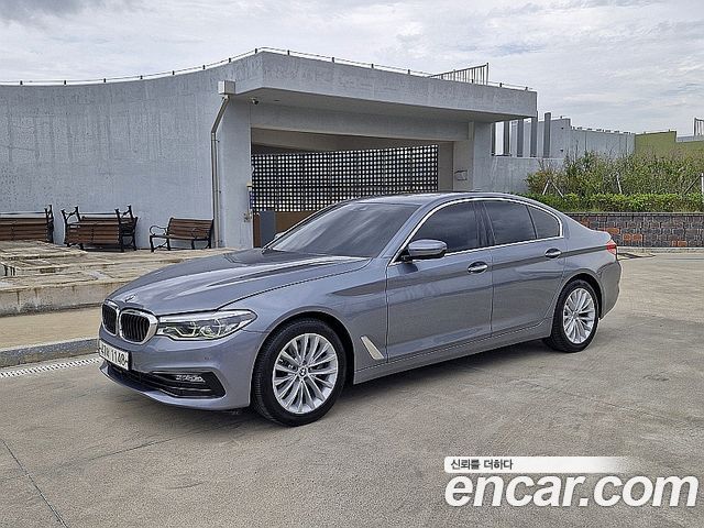 BMW 5-Series 2018 — photo 1
