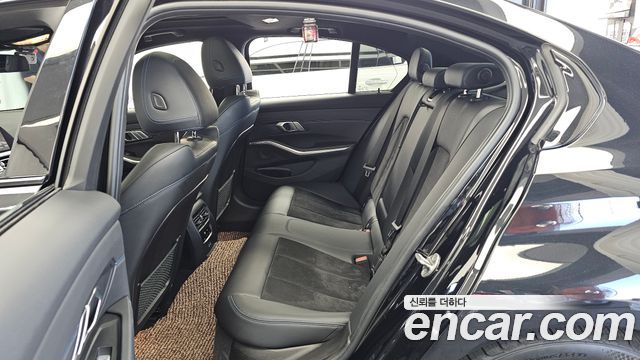 BMW 3-Series 2021 — photo 16