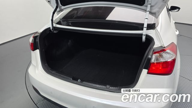Kia K3 2015 — photo 31