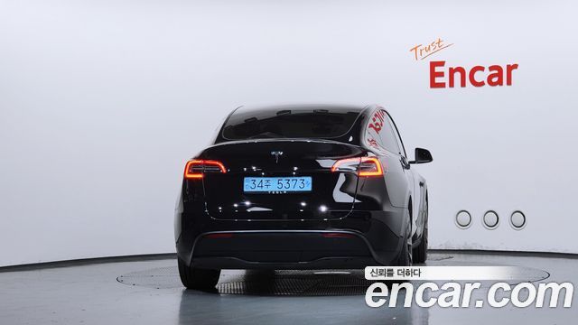 Tesla Model Y 2024 — photo 4