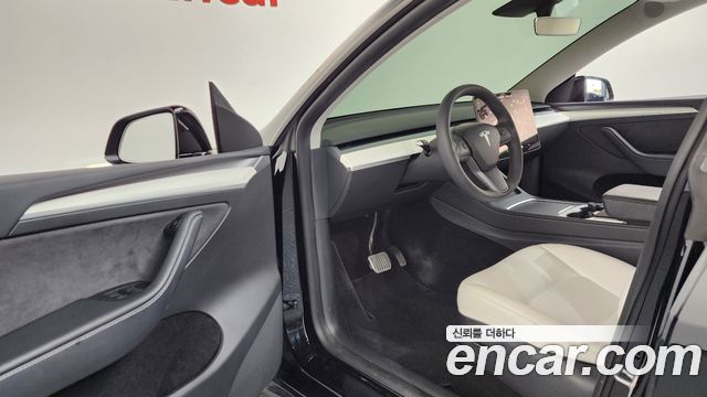 Tesla Model Y 2024 — photo 13