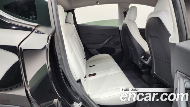 Tesla Model Y 2024 — photo 17