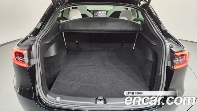 Tesla Model Y 2024 — photo 26