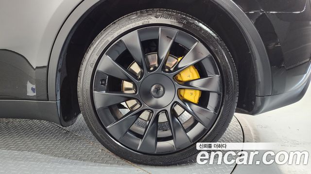 Tesla Model Y 2024 — photo 7