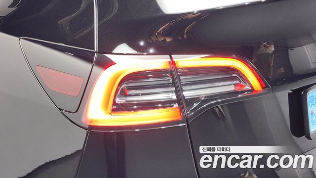 Tesla Model Y 2024 — photo 9