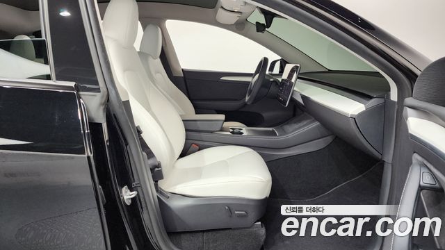 Tesla Model Y 2024 — photo 16