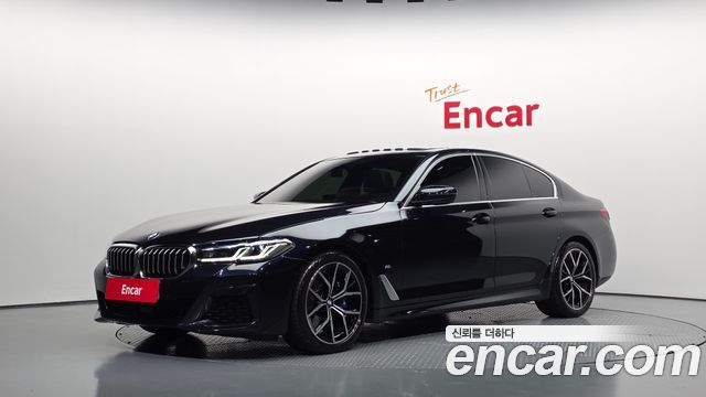 BMW 5-Series 2023 — photo 1