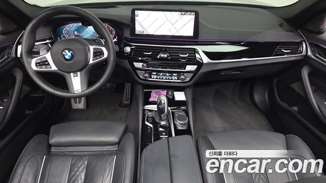 BMW 5-Series 2023 — photo 10
